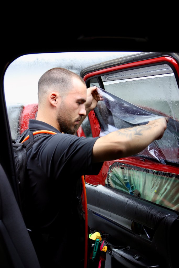Professional window tinting service in Epping workshop