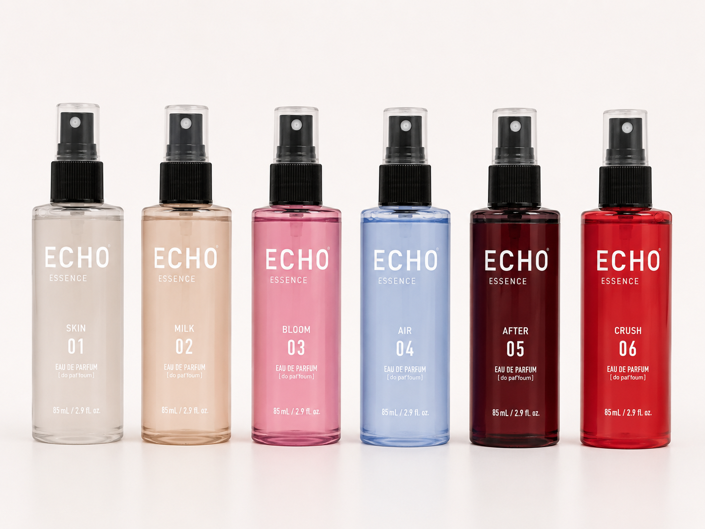 Six Echo Essence eau de parfum spray bottles — Skin 01, Milk 02, Bloom 03, Air 04, After 05, and Crush 06 — lined up on an off-white background