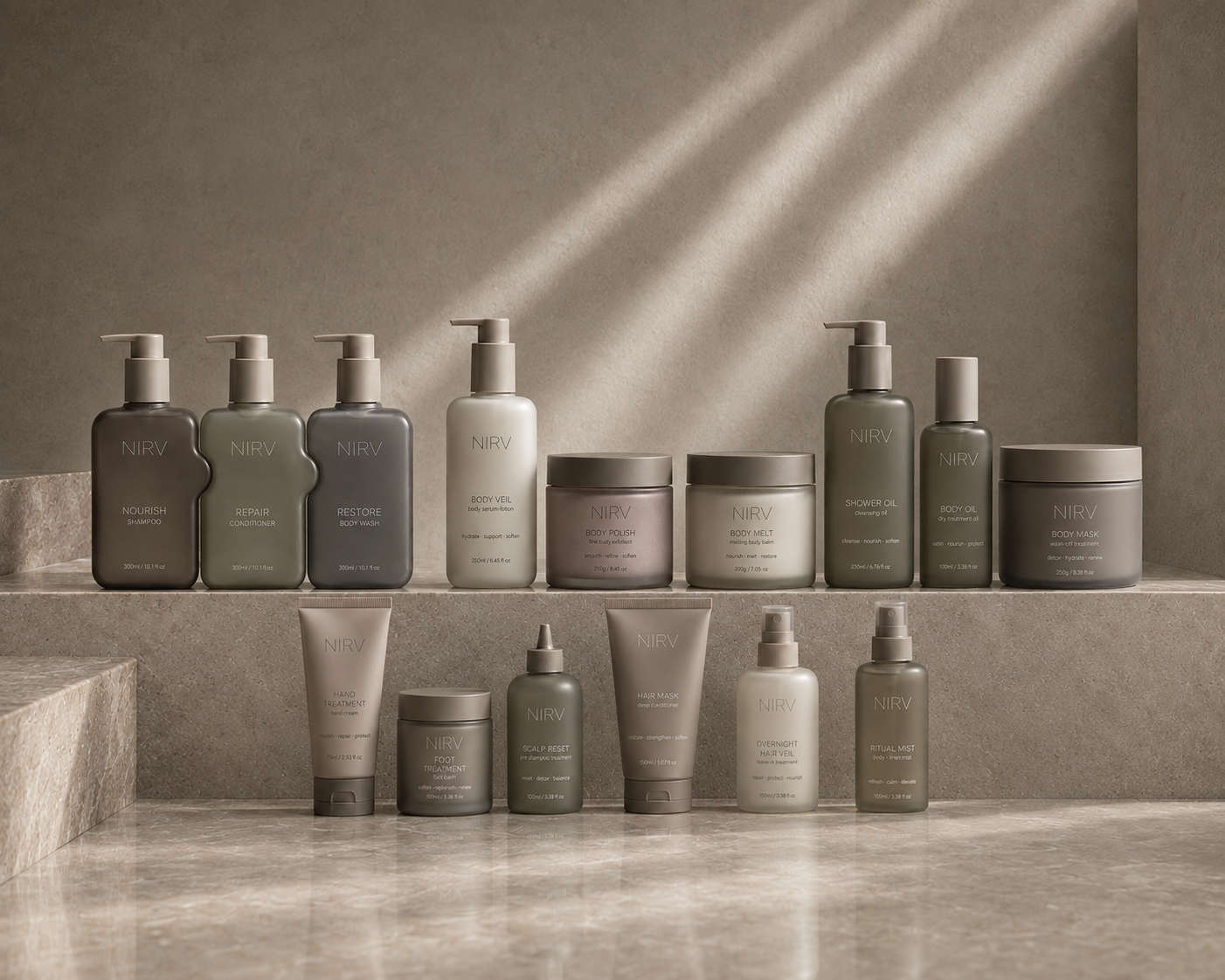 A collection of Nirv skincare and haircare products in muted earth-toned bottles and jars arranged on a beige stone-textured stepped surface