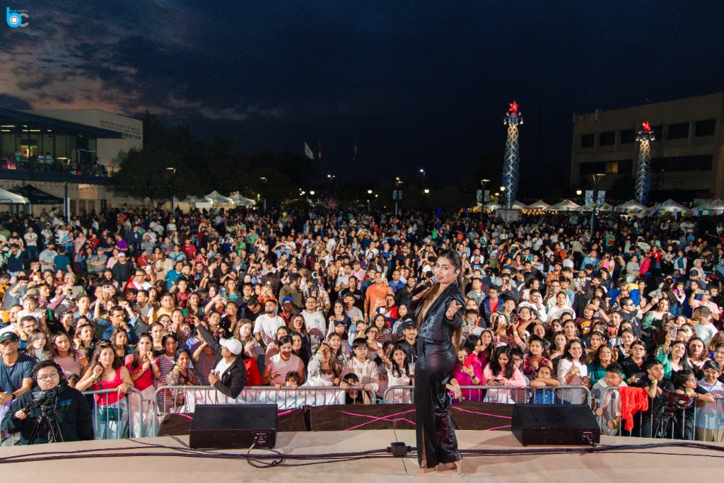 Performer on stage at twilight