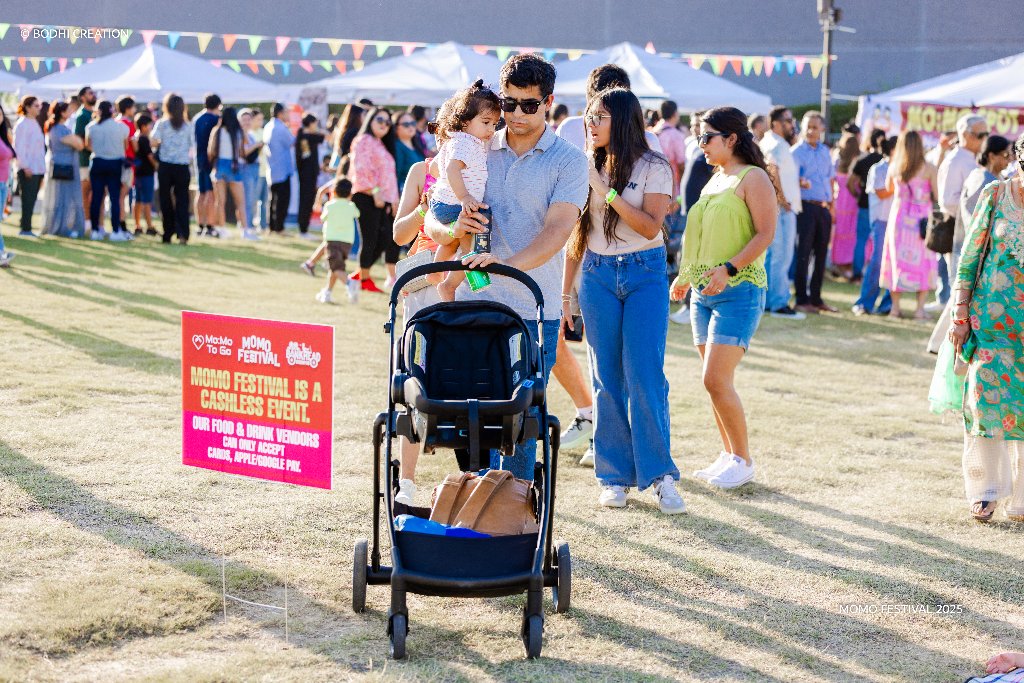 Family walking through the festival grounds
