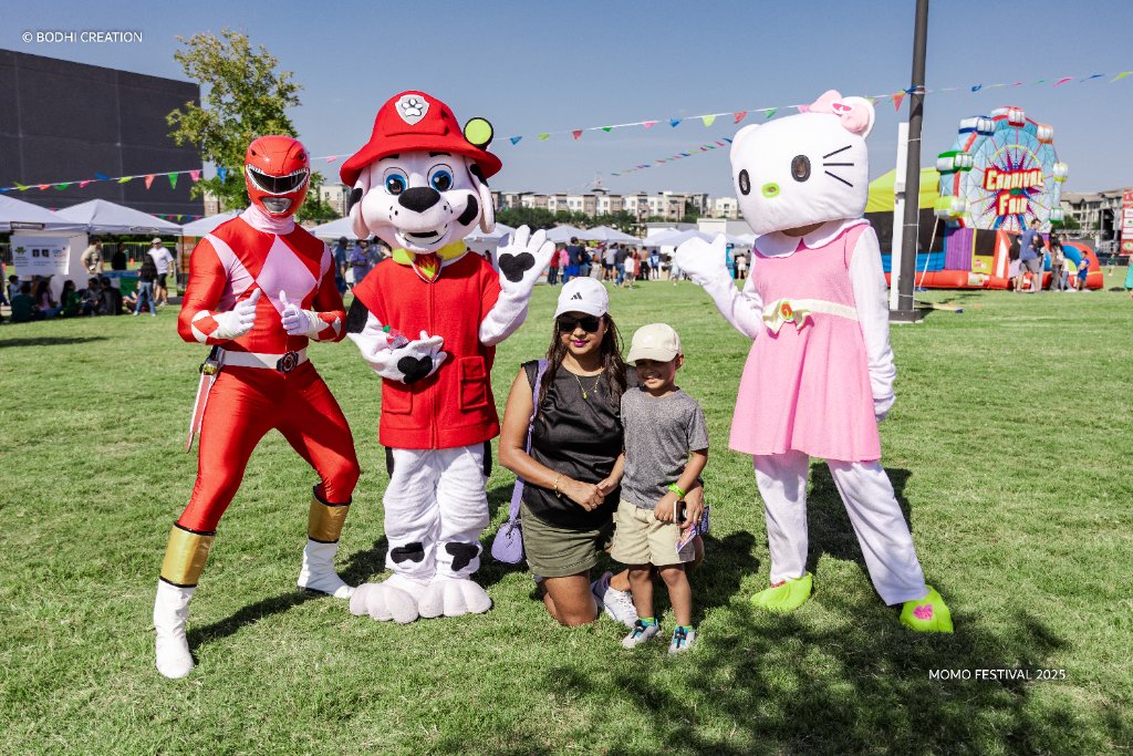 Costumed characters entertaining kids