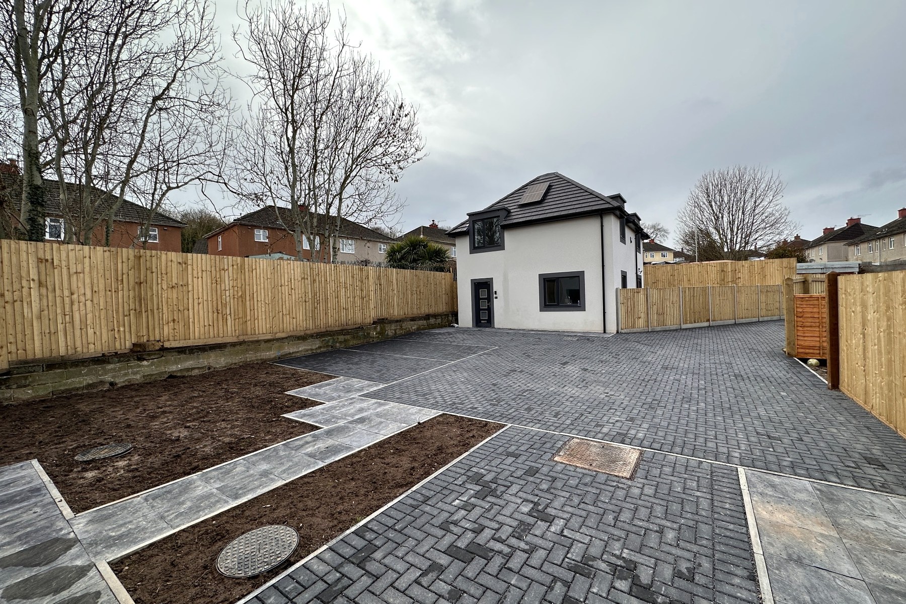 Individual dwelling with dedicated parking bay.
