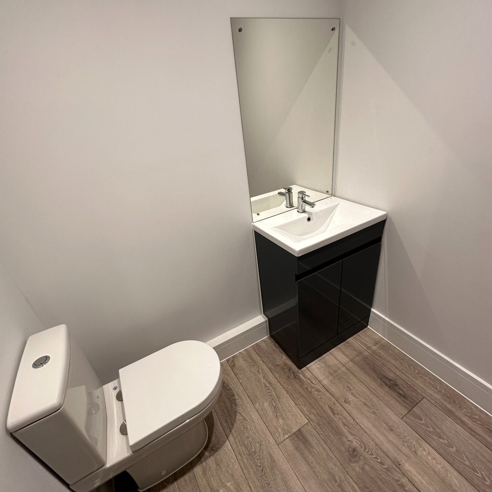 Ground-floor cloakroom with WC and vanity.