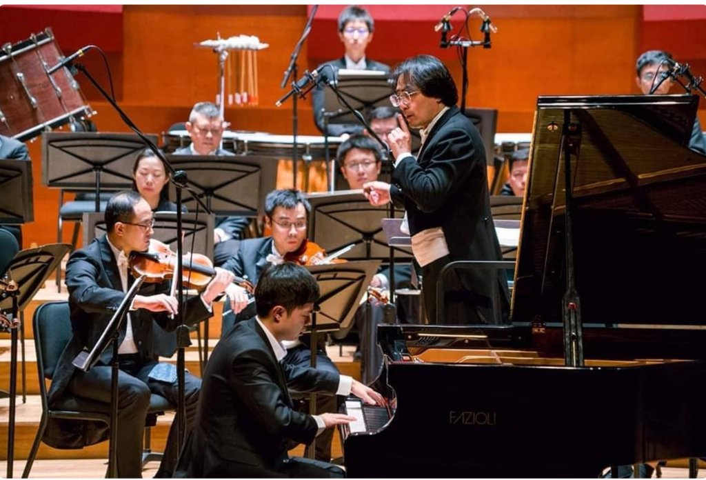 Performance with orchestra — warm interior