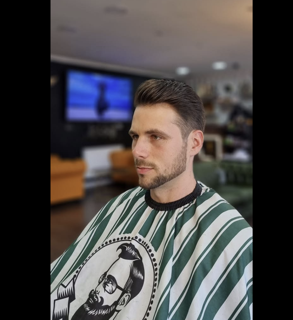 Taper fade with side part — precision cut at VIP Cut Barber
