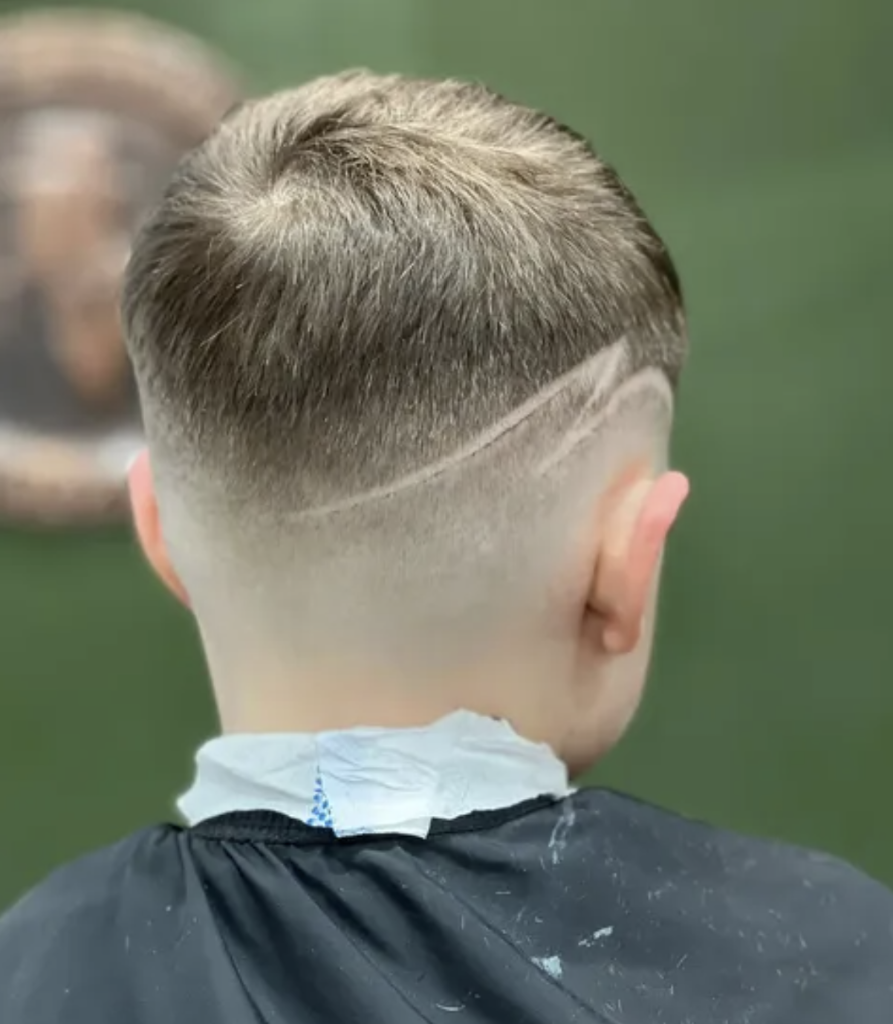 Clean skin fade with hard-part line detail — precision barbering at VIP Cut Barber Glasgow