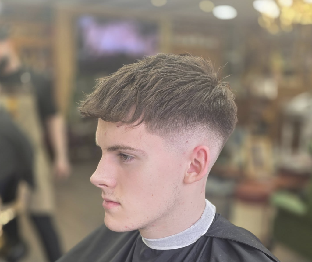 Textured fringe with skin fade at VIP Cut Barber