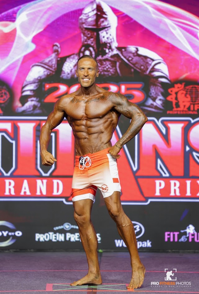 Alpha Syndicate athlete competing on stage