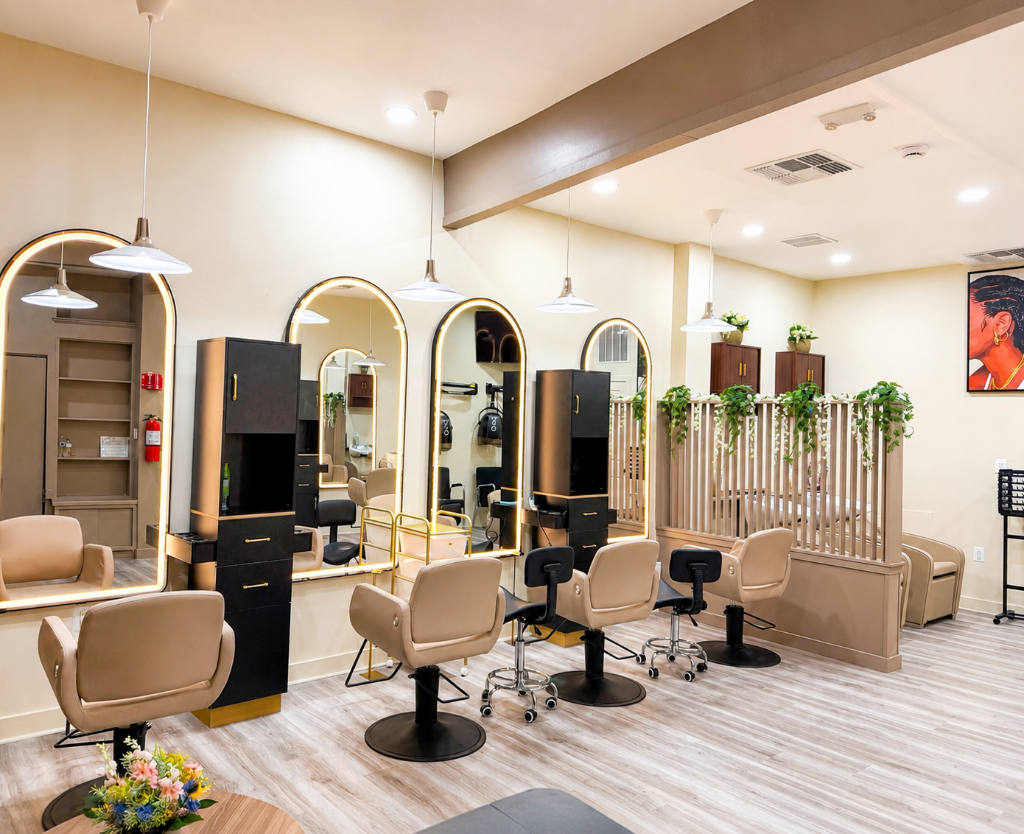 Inside Chapi Hair Salon — professional styling stations with arched LED mirrors