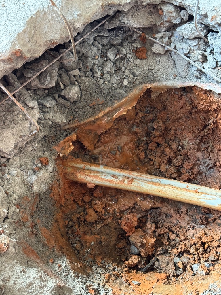 Pinhole leak located in the grey poly line