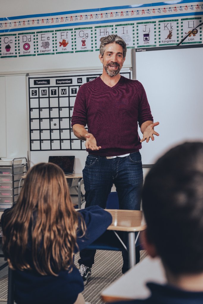 James Burden presenting to a classroom of students, illustrating professional development and workshop facilitation