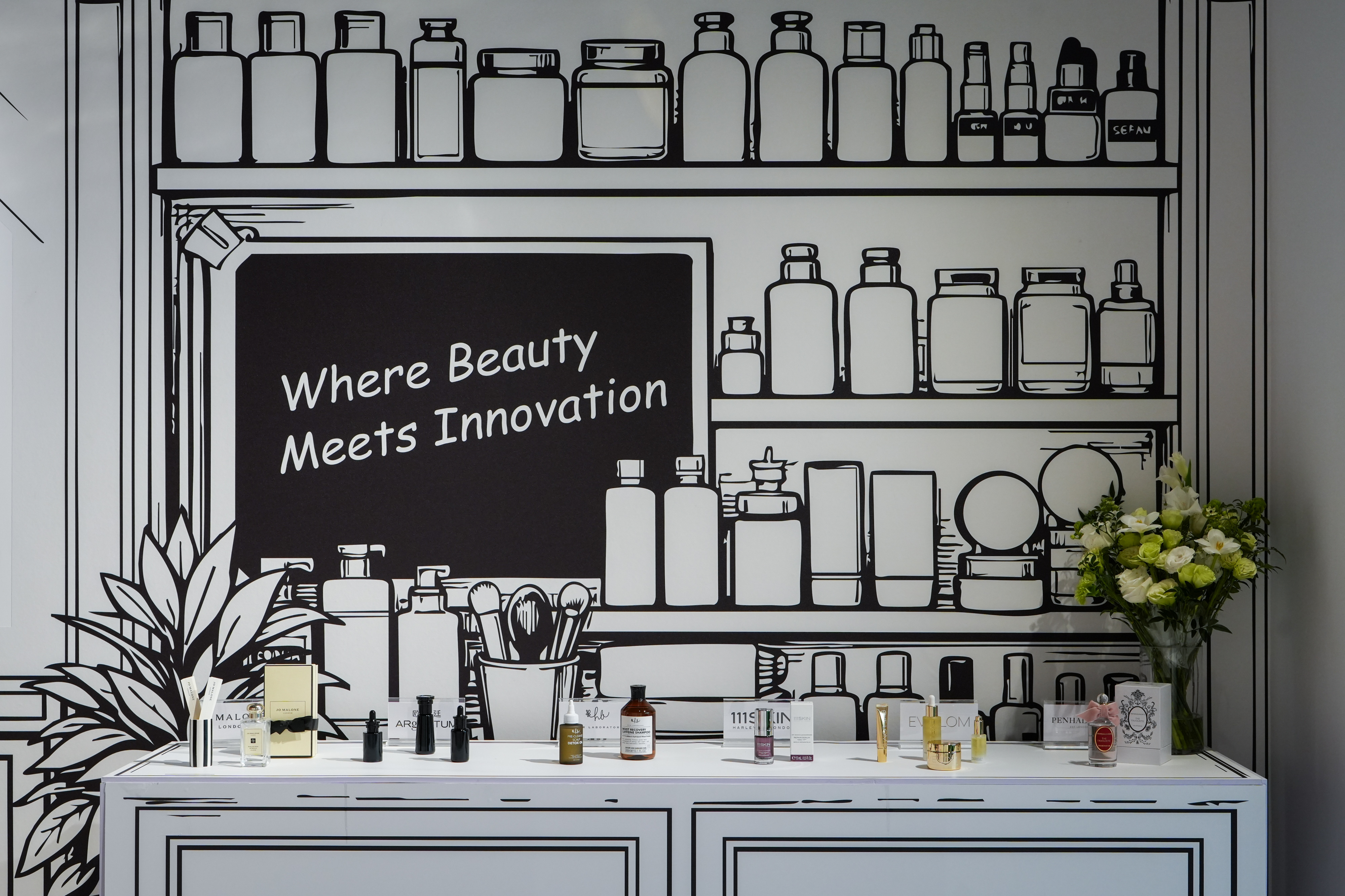 Where Beauty Meets Innovation: brands presented along the illustrated counter.