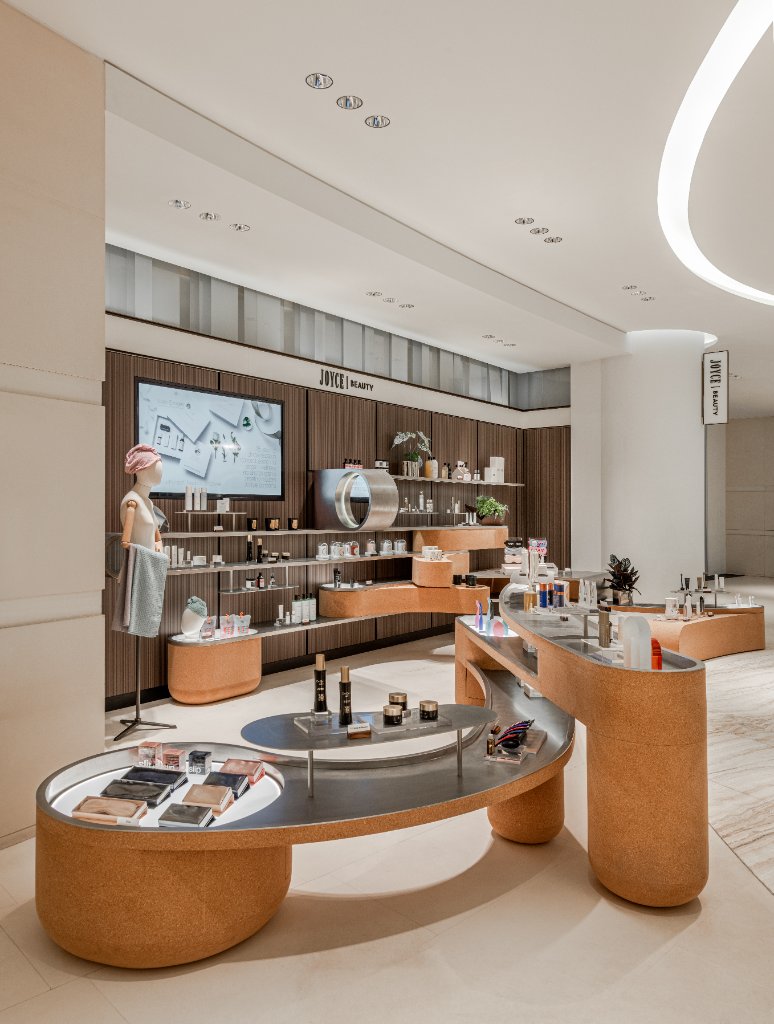 Sculpted cork display tables with colour and skincare edits