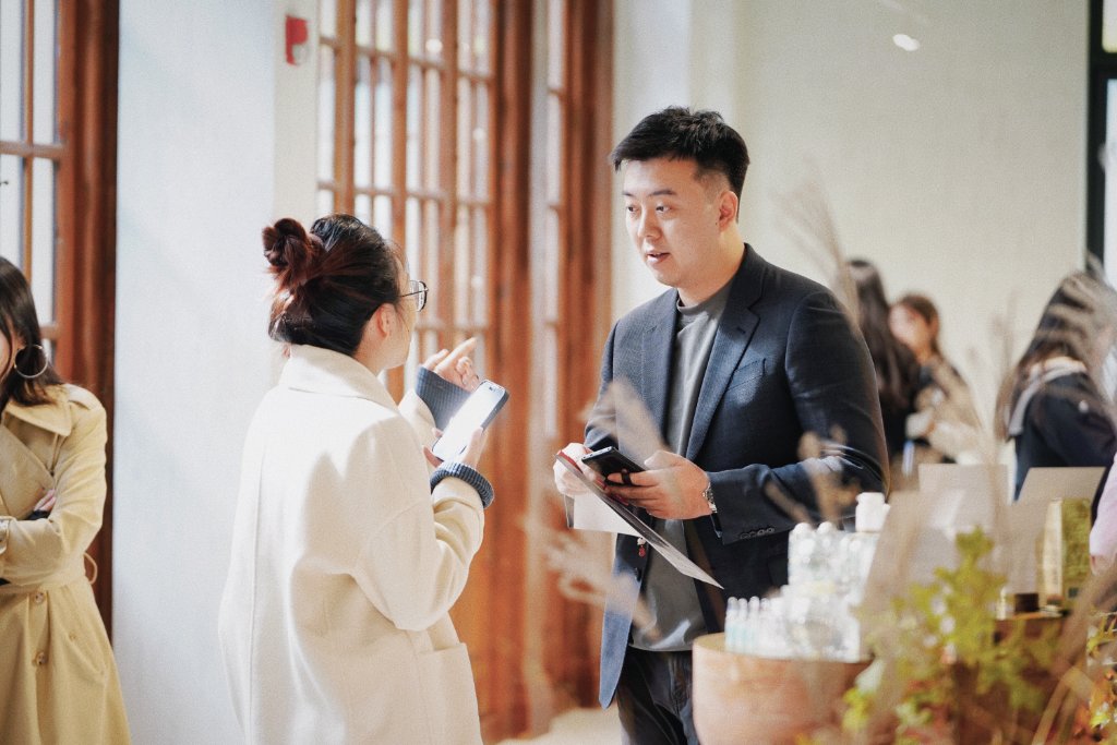 Guests in conversation at the expo