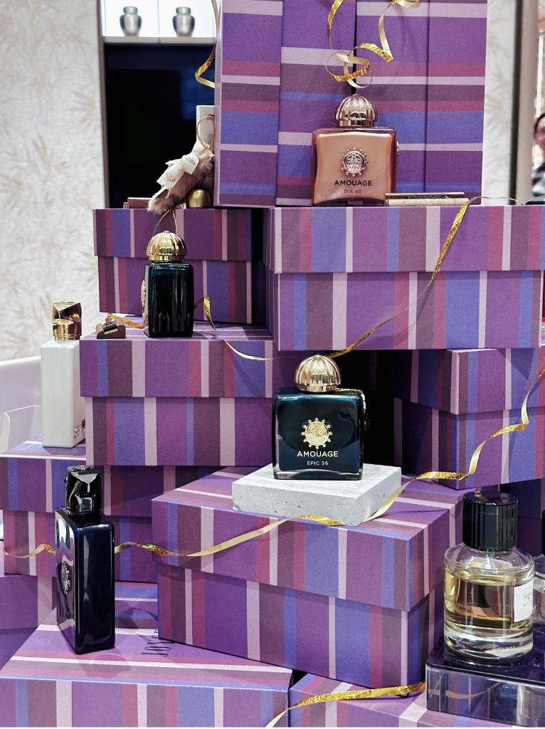 Skincare and fragrance arranged across the tiered display