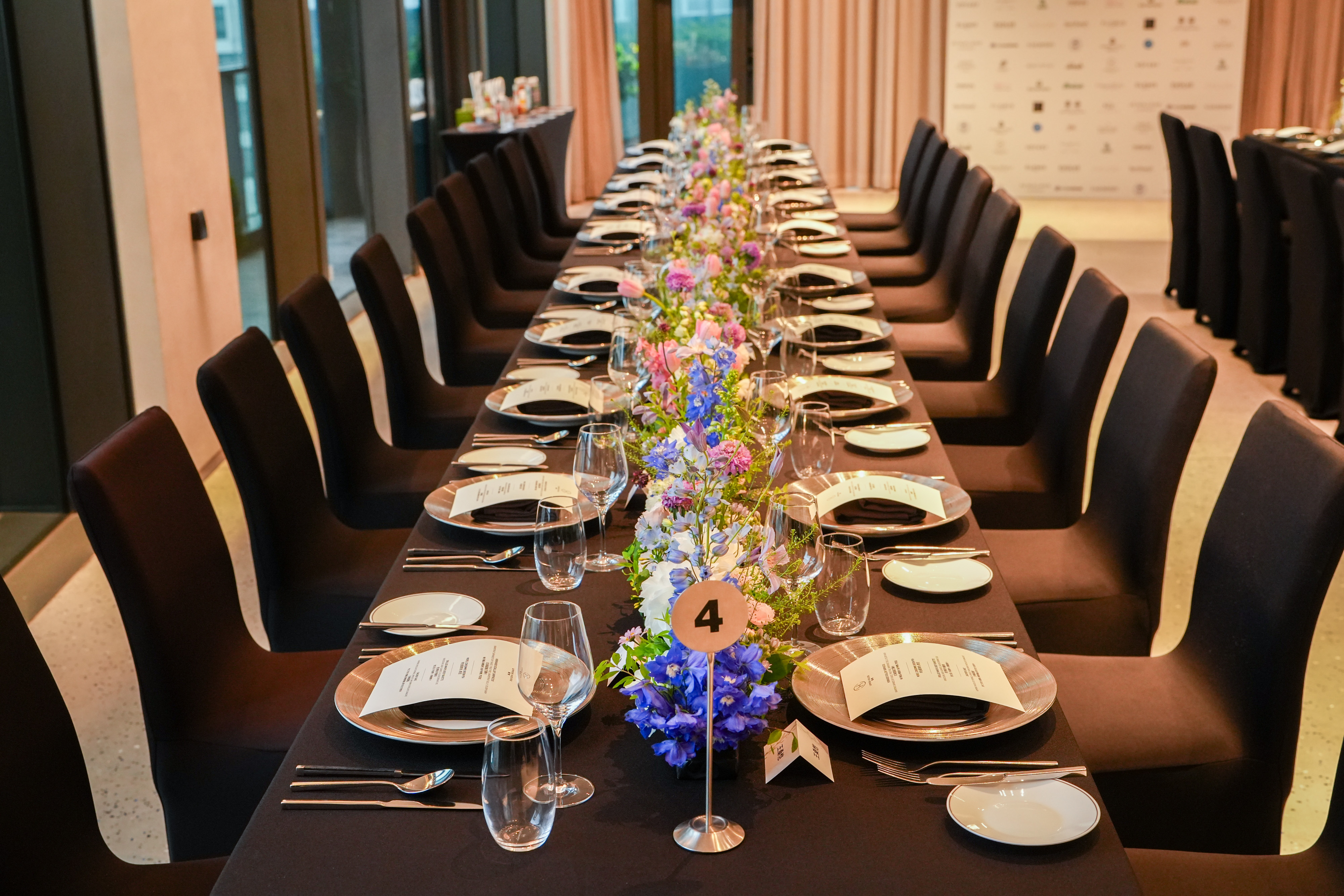 A long table dressed for the evening, ahead of the ten category awards.