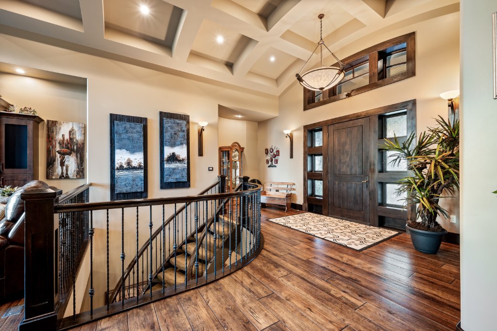 Custom spiral staircase with wrought iron balusters