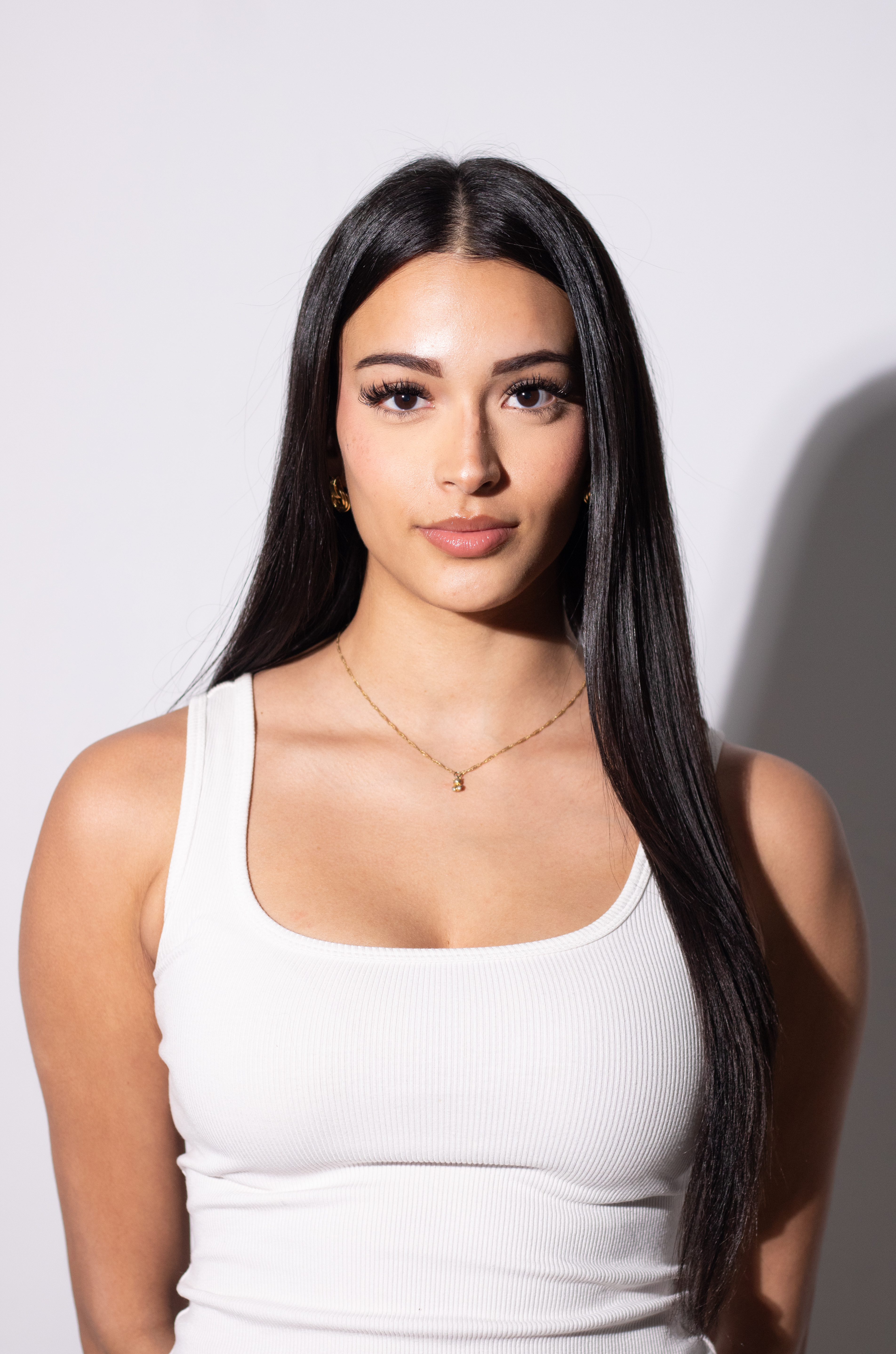 Studio portrait, woman with long black hair