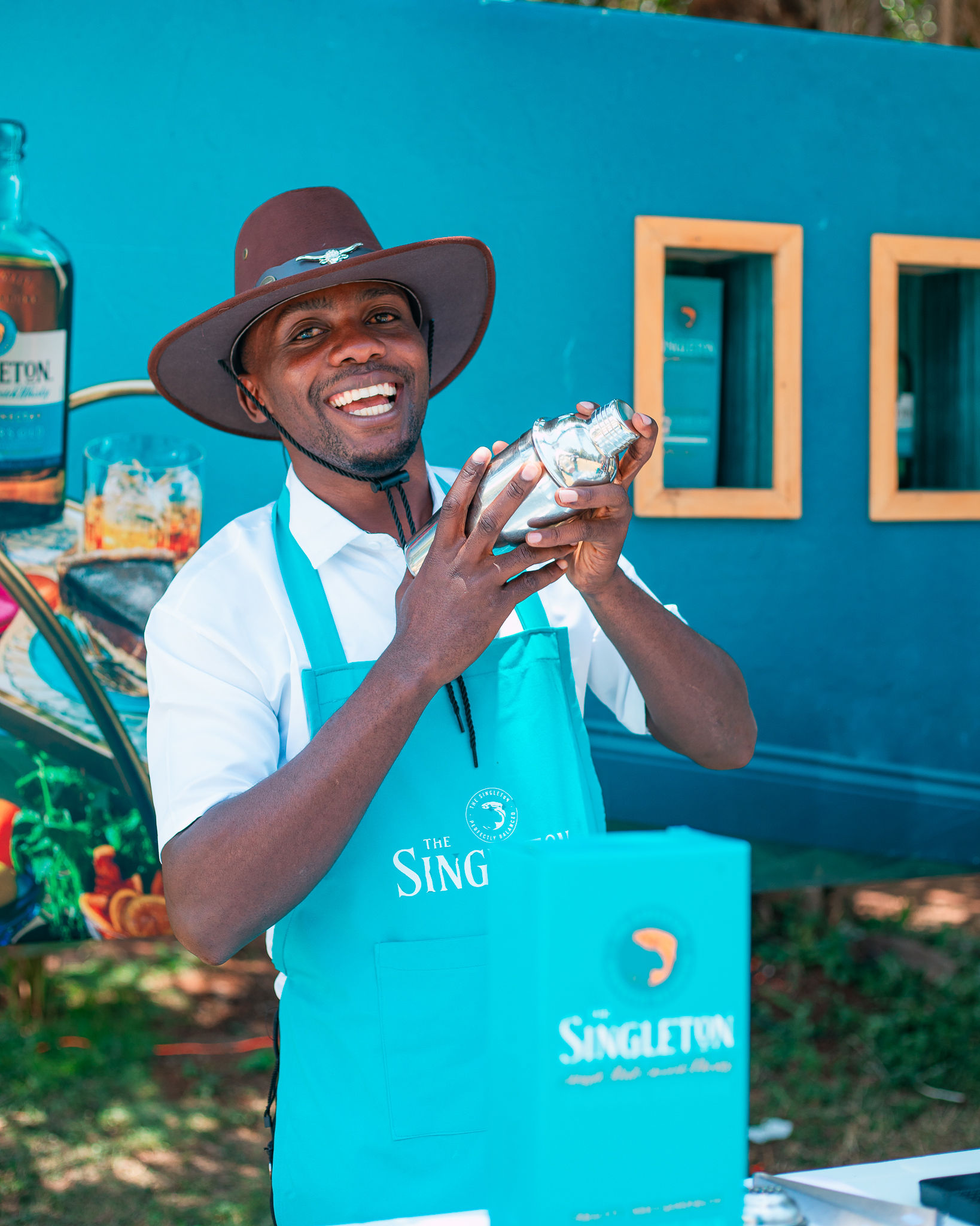 Singleton brand bartender serving guests