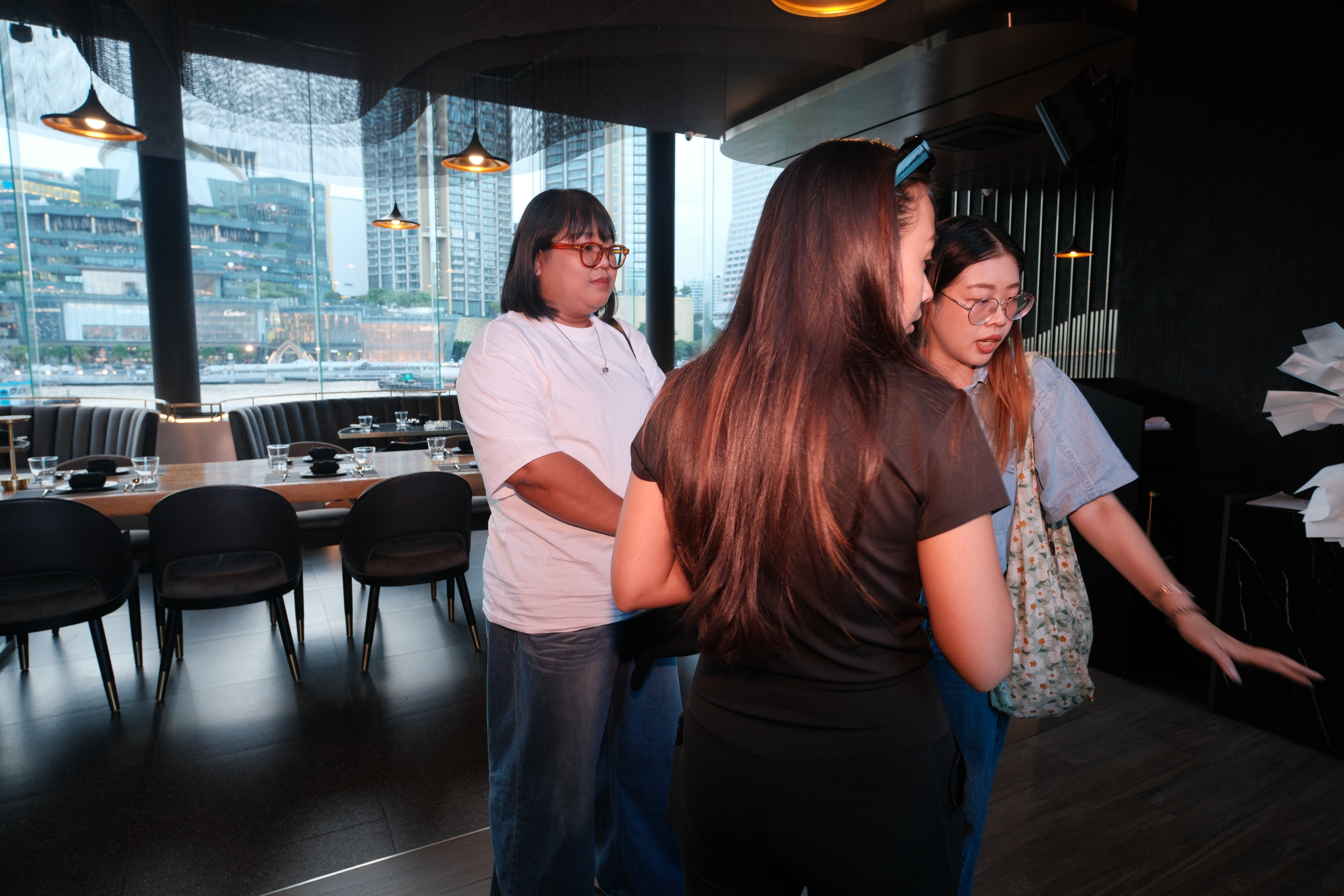 Crew scouting the restaurant layout before the proposal