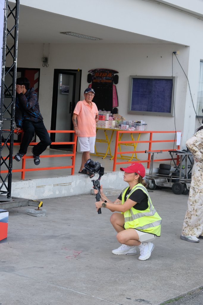 Behind the scenes documentary filming at a kart track