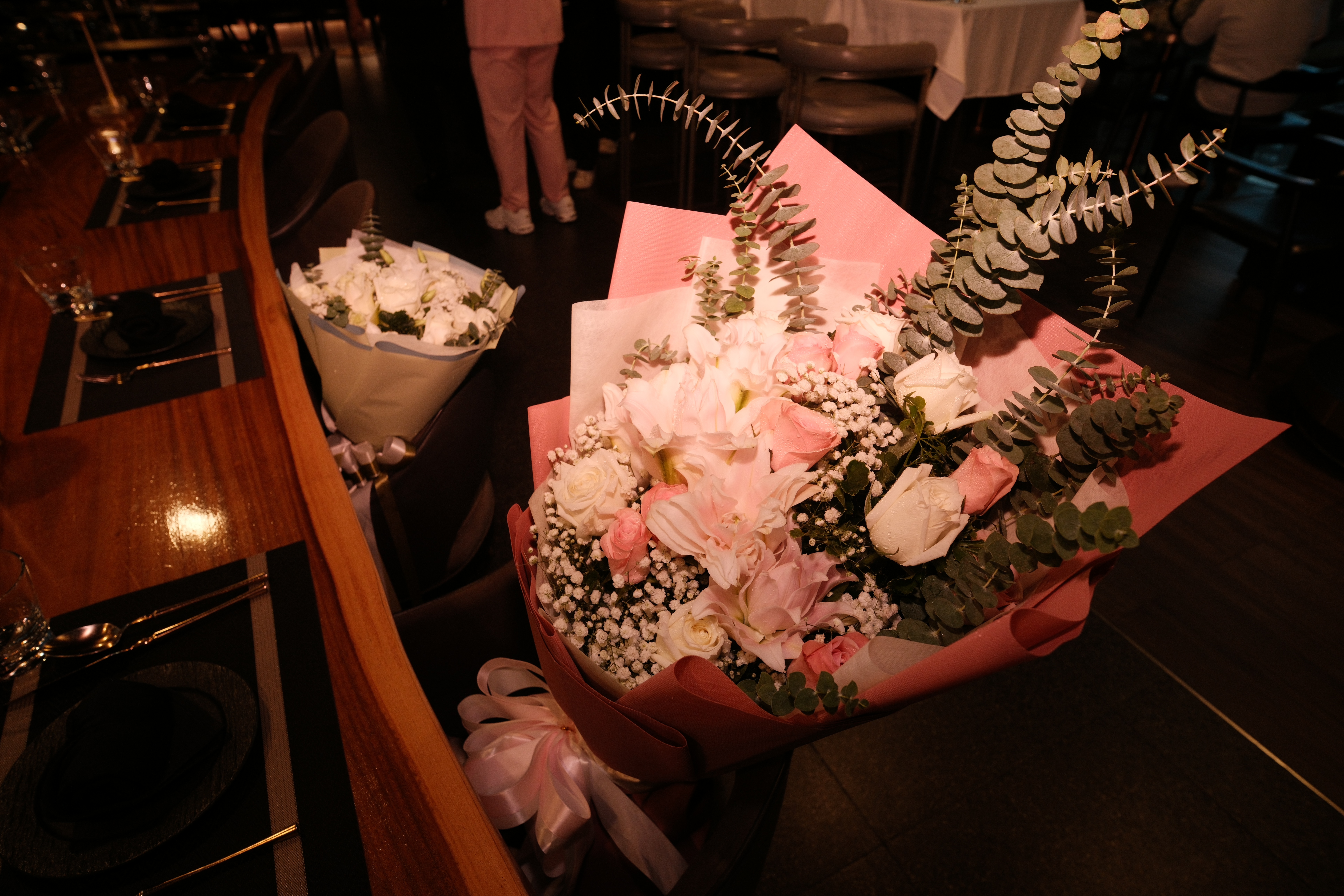 Floral bouquets arranged as props for the proposal film