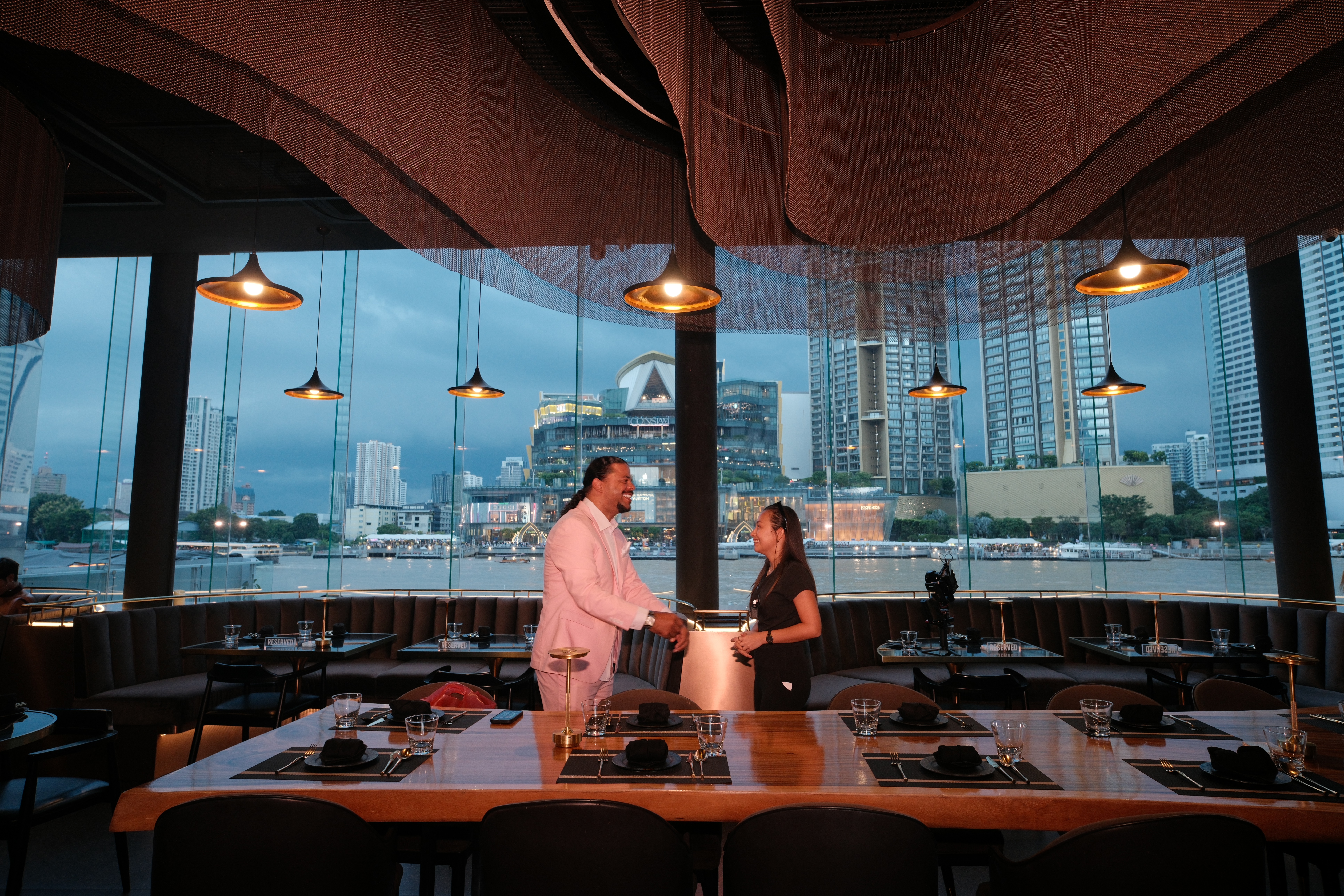 Wide angle of the Osca & Blanco dining room overlooking the Chao Phraya River