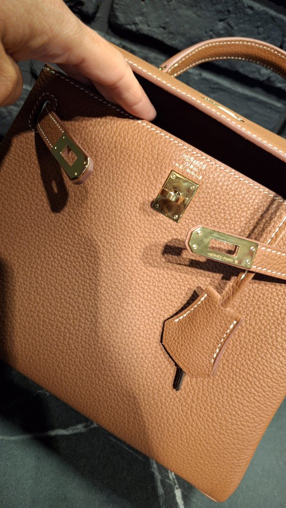 Close-up of internal stamp with serial number WRH020YX and Hermès zipper