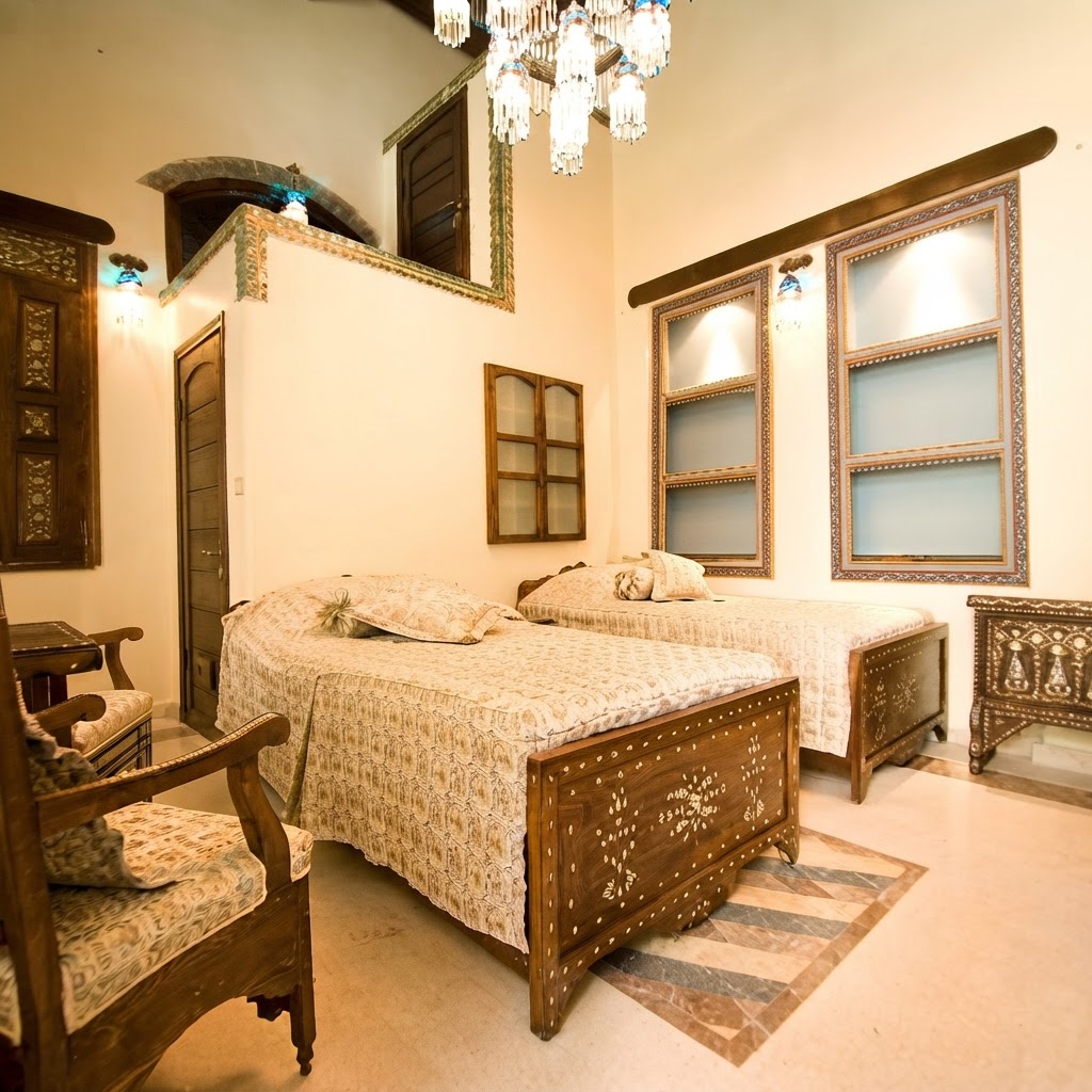 The Courtyard Rooms — Opening onto the fountain