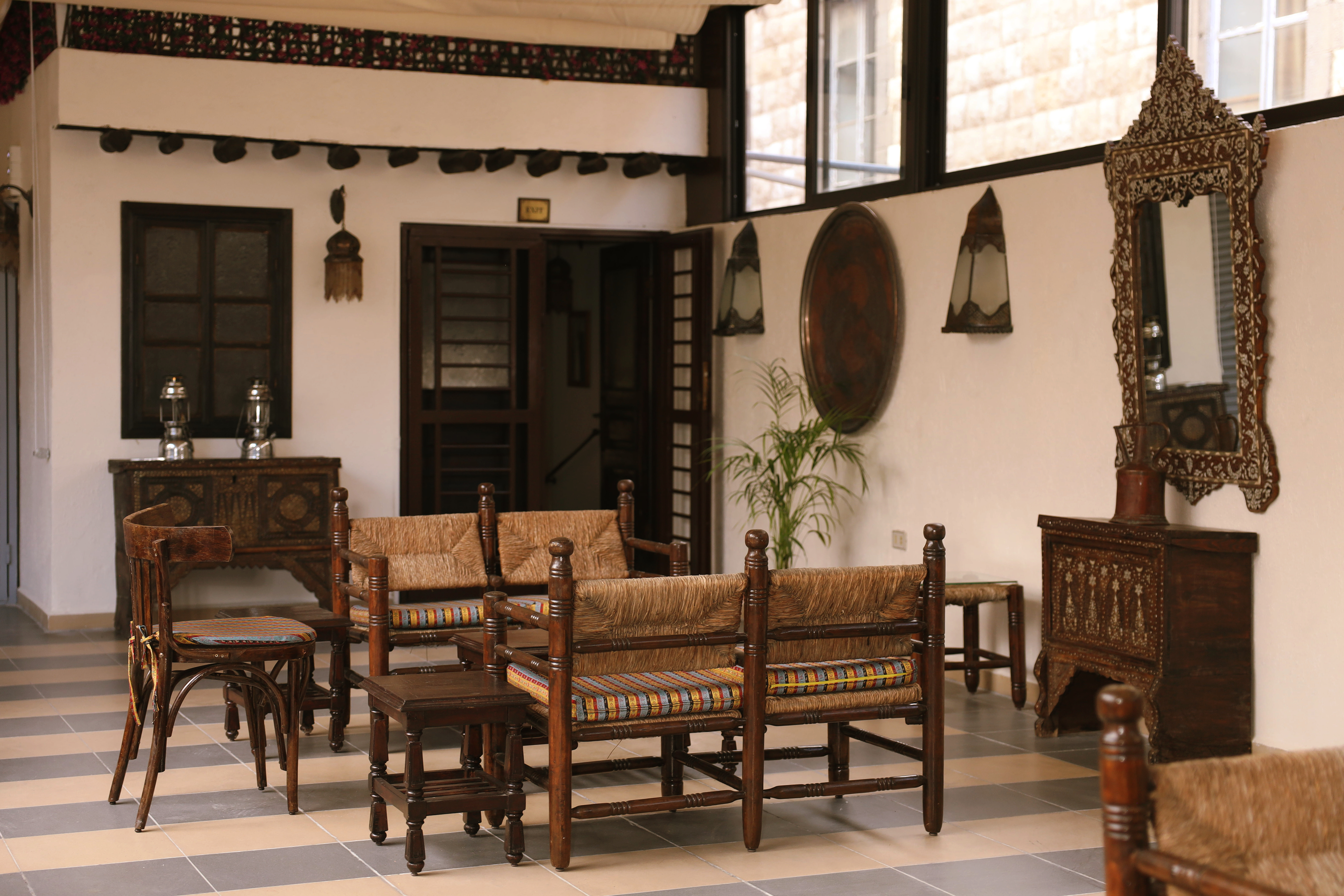 Terrace Guest Lounge — console, lanterns and doorway