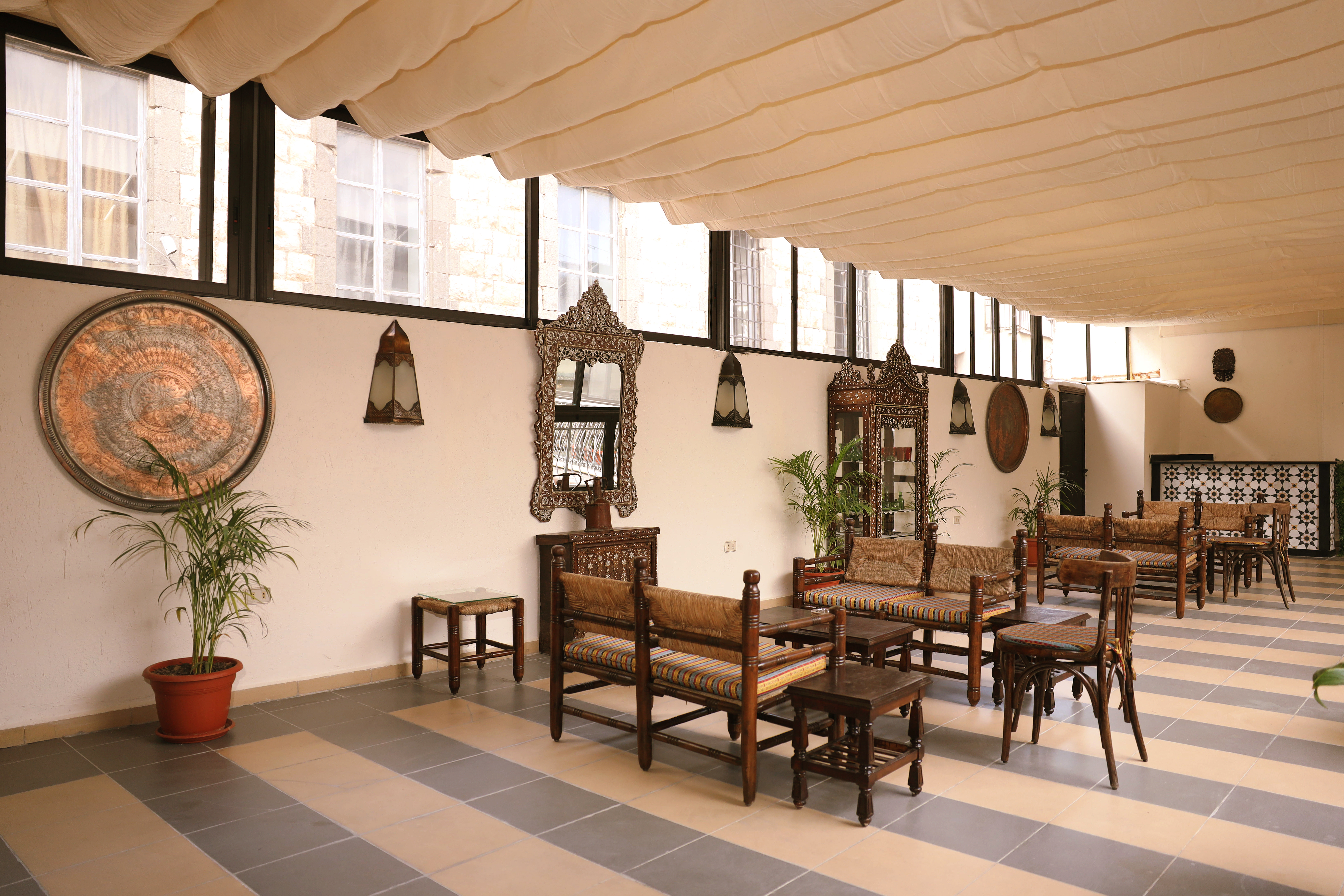 Terrace Guest Lounge — copper platter and inlaid mirror