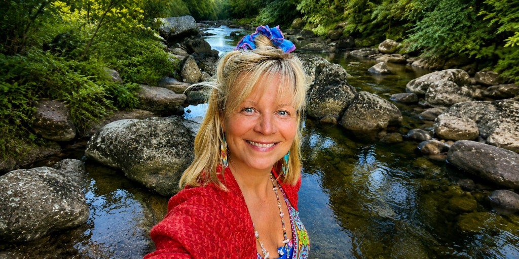 Vittoria Immortelle smiling by a forest stream