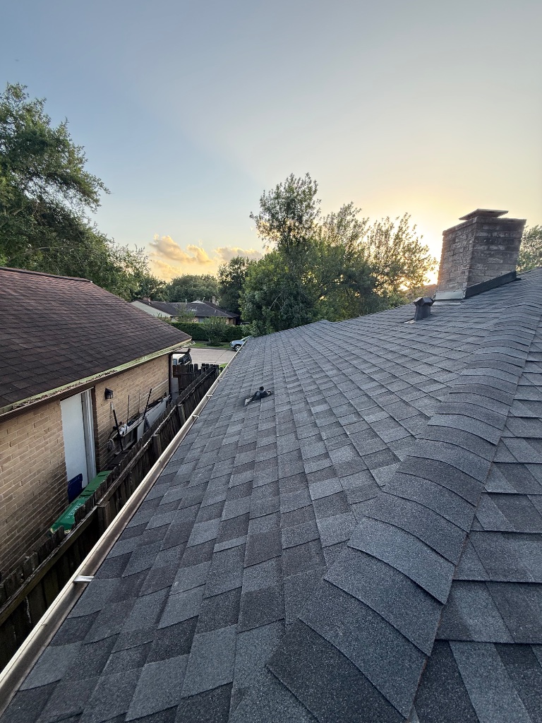 New shingle roof replacement aerial view — Coronado Roofing