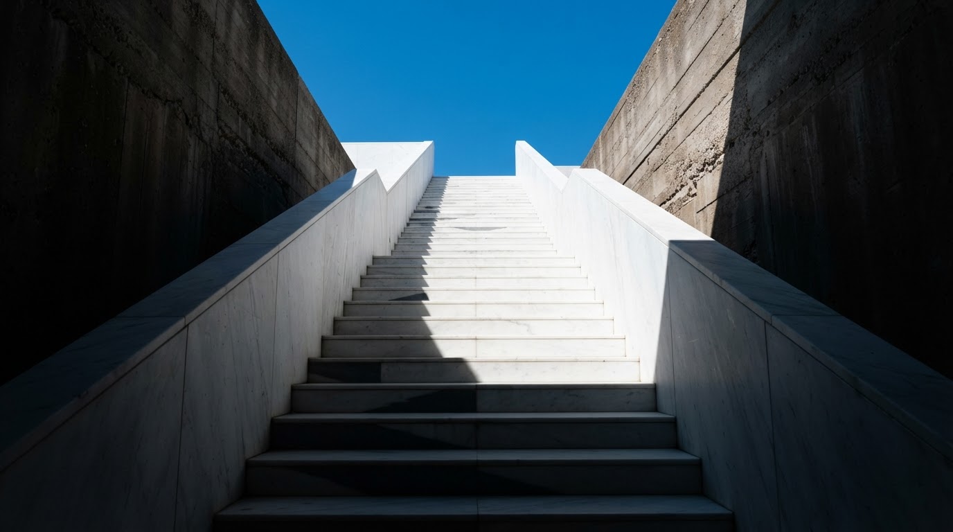 White marble staircase ascending toward clear sky, symbolizing steady progress toward financial goals