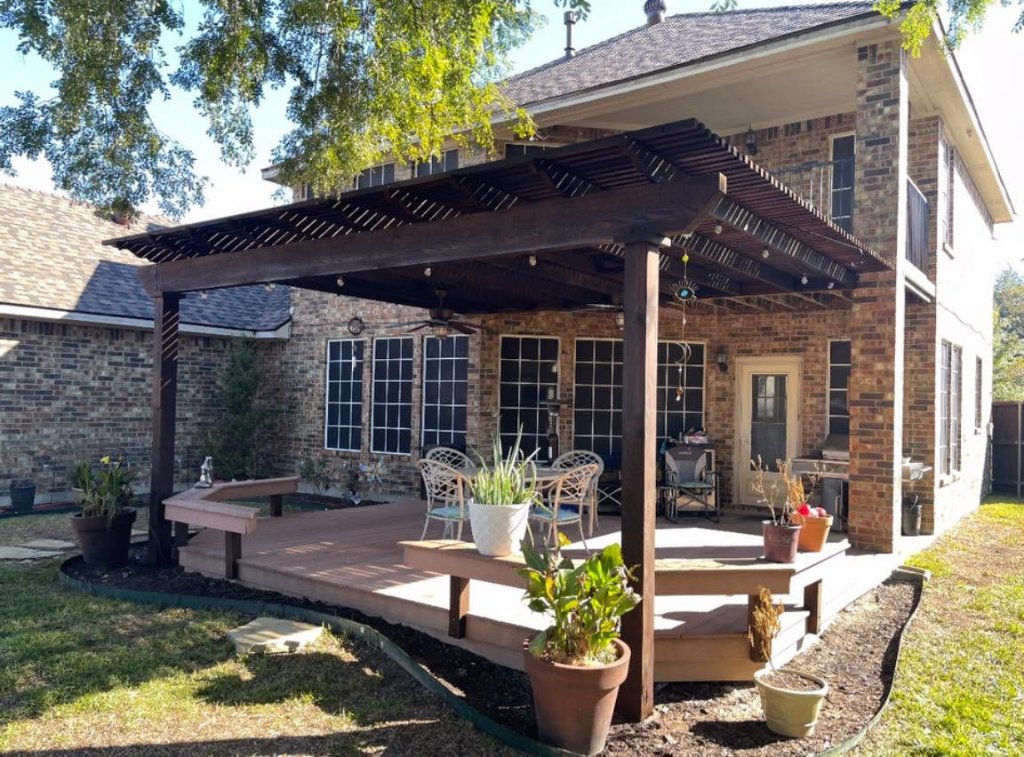 Wood gate restoration with fresh stain application