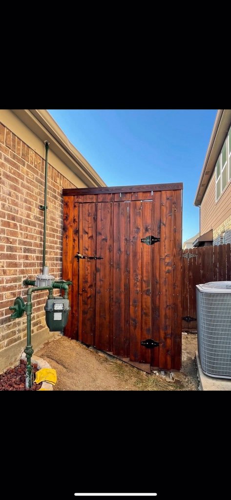 Wood fence re-staining project in progress