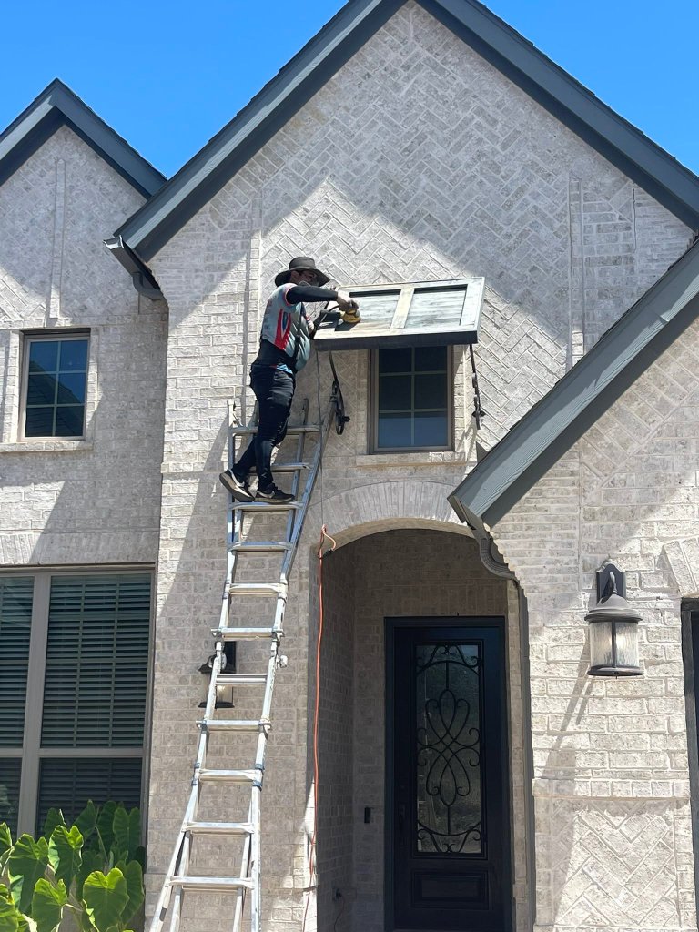 Re-stained exterior wood garage door restoration project