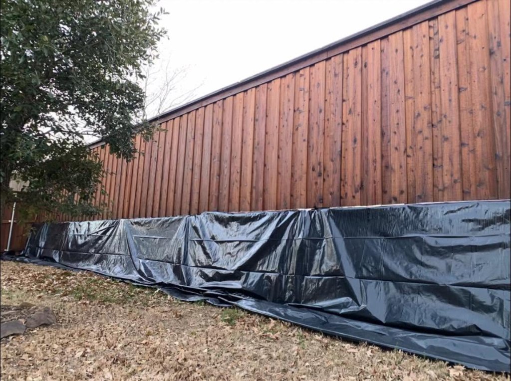 Stained wood pergola with outdoor seating area in North Texas