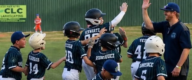 River Monsters Futures team celebrating on the field
