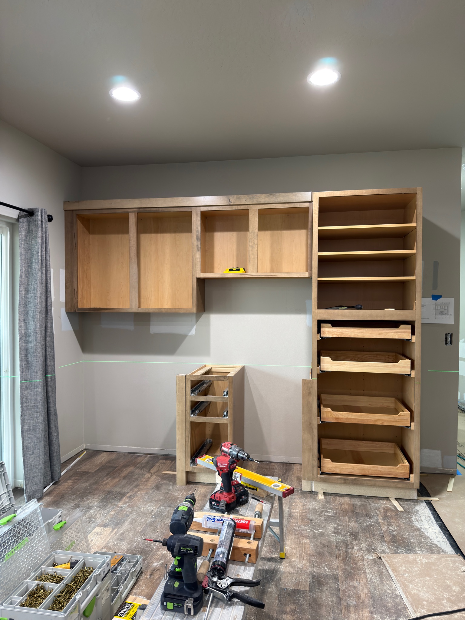 Custom wood cabinetry install in progress