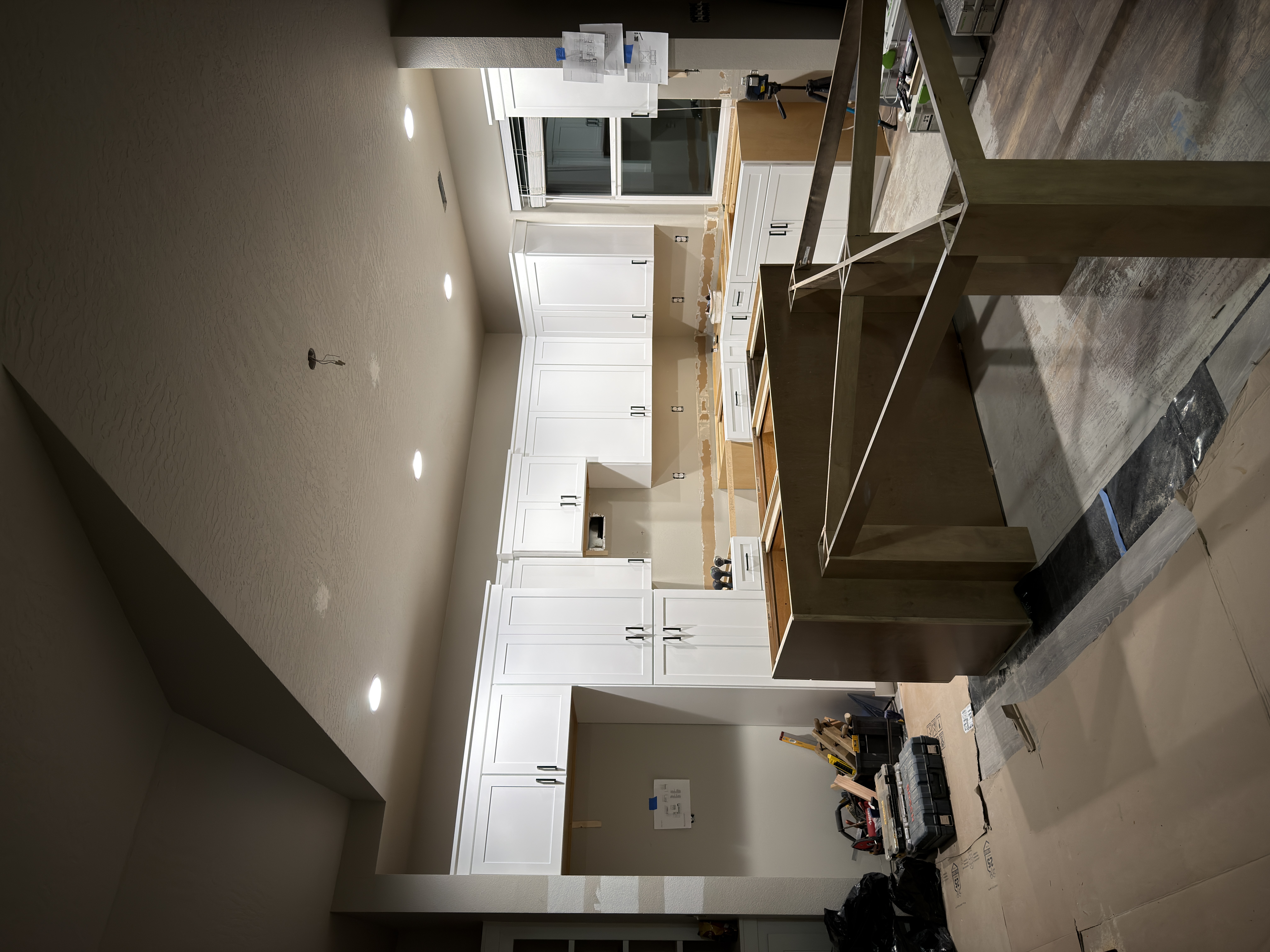 White Shaker kitchen renovation with island framing