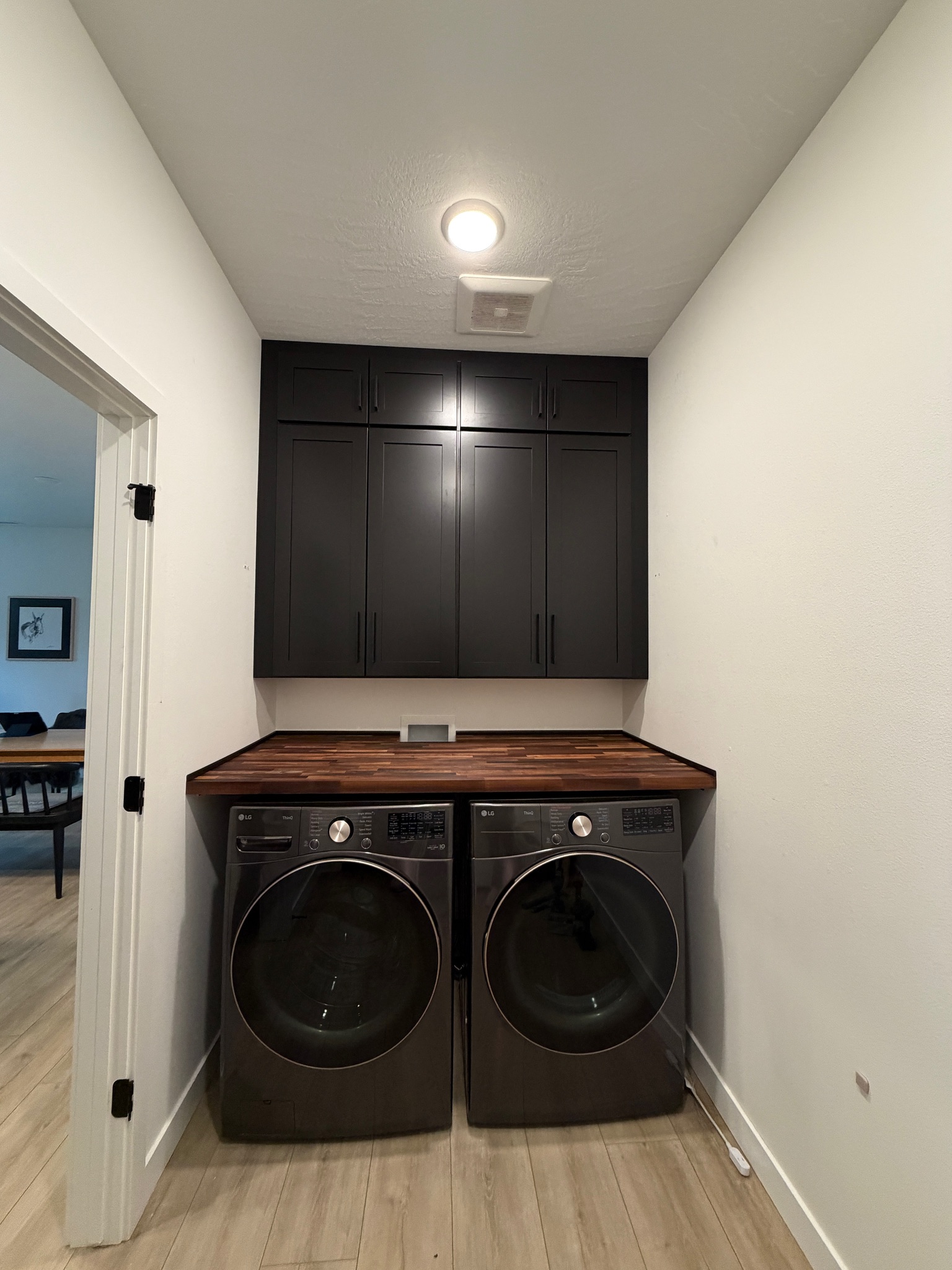 Charcoal Shaker laundry alcove with butcher block counter