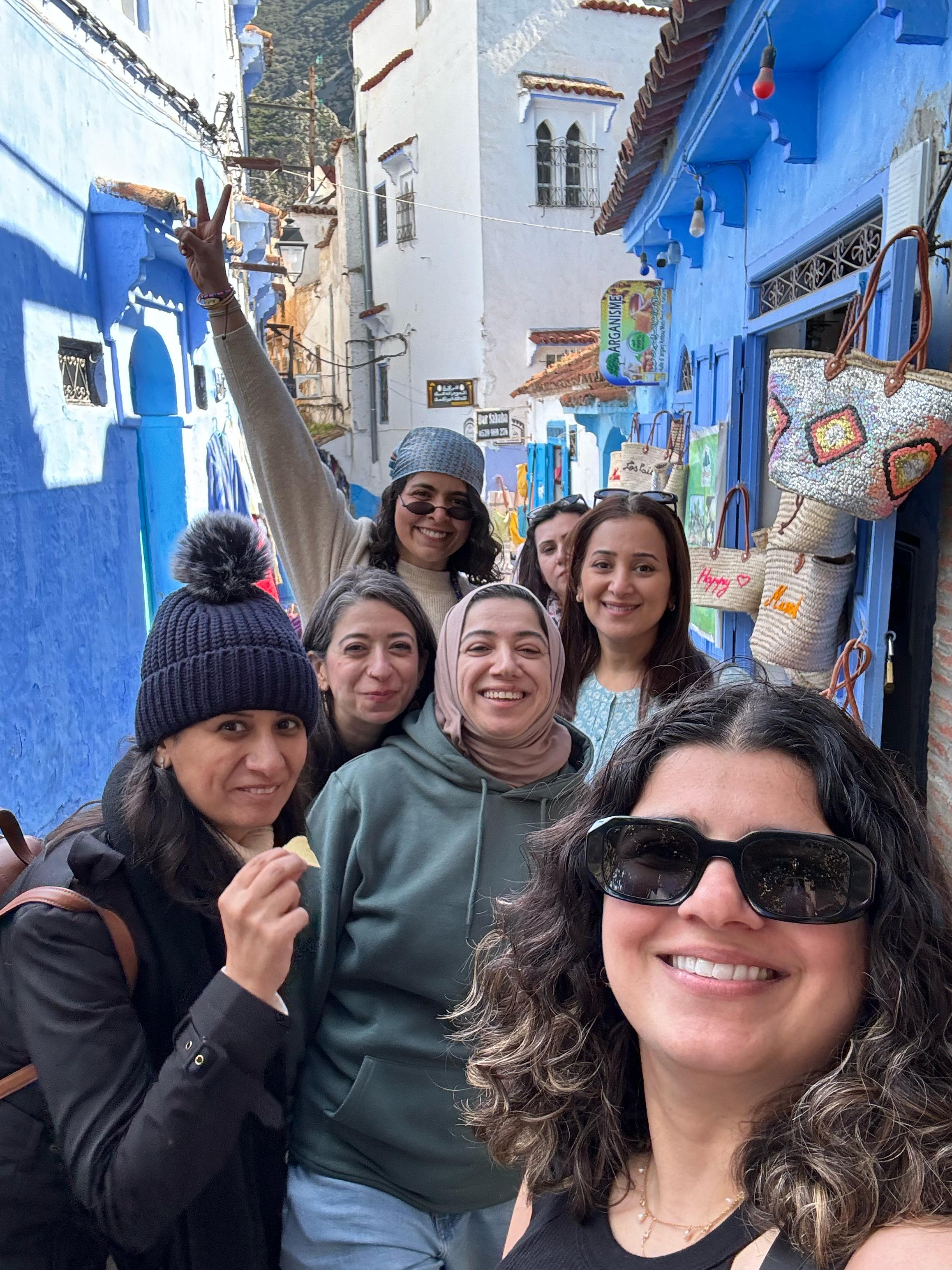 Retreat guests in the blue streets of Chefchaouen
