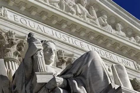 Supreme Court pediment with statue representing equal justice under law