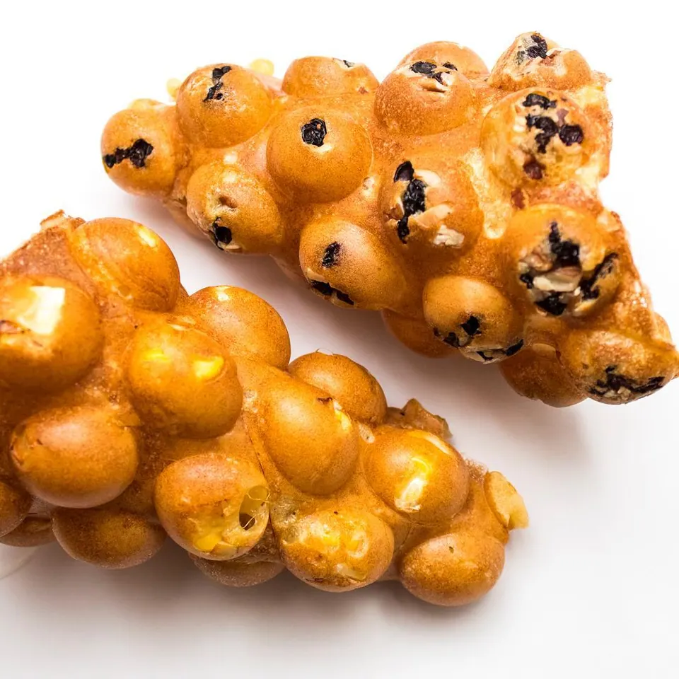 Freshly baked Muffles showing their golden pockets and chocolate chips