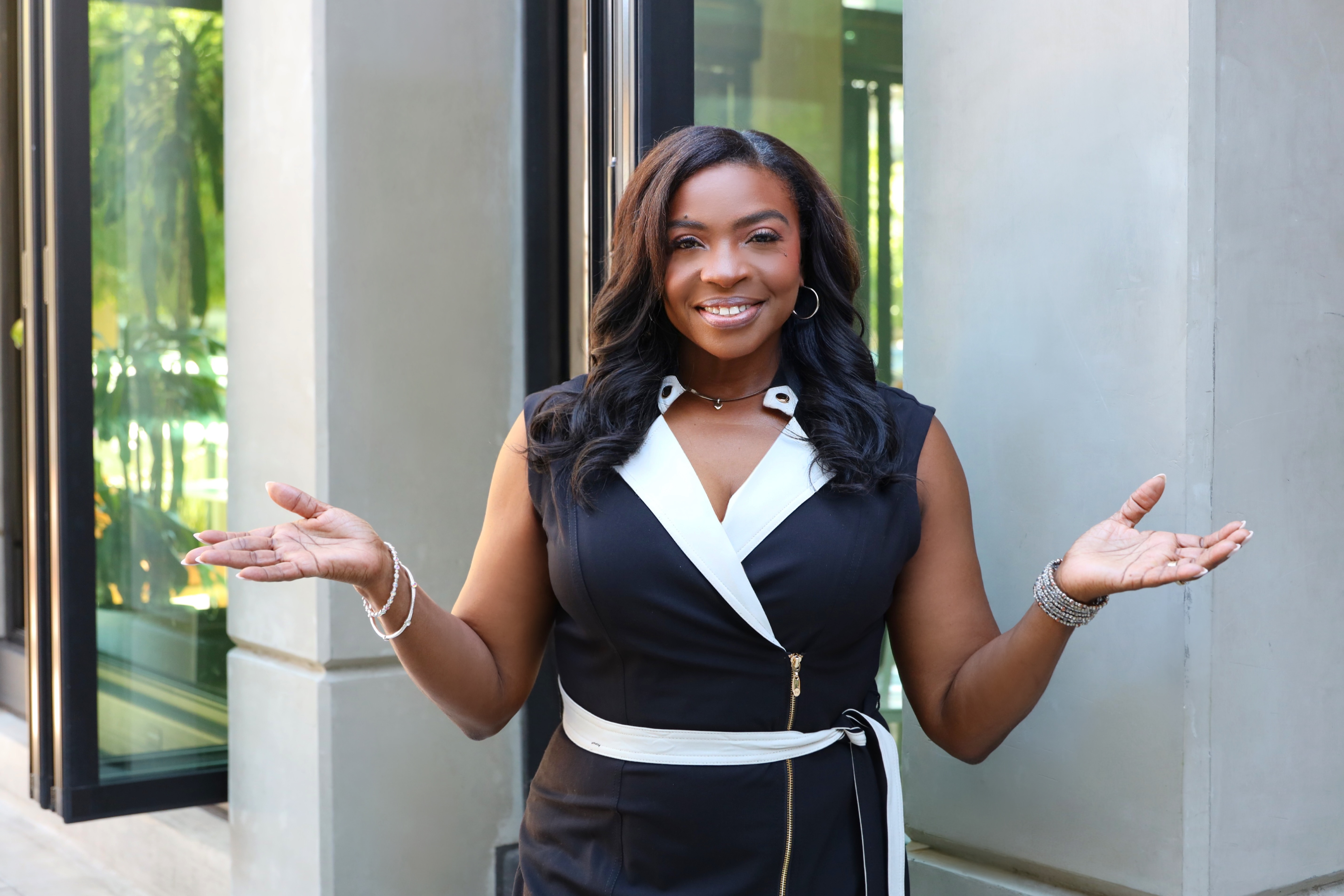 Coach Charlene Johnson with open hands