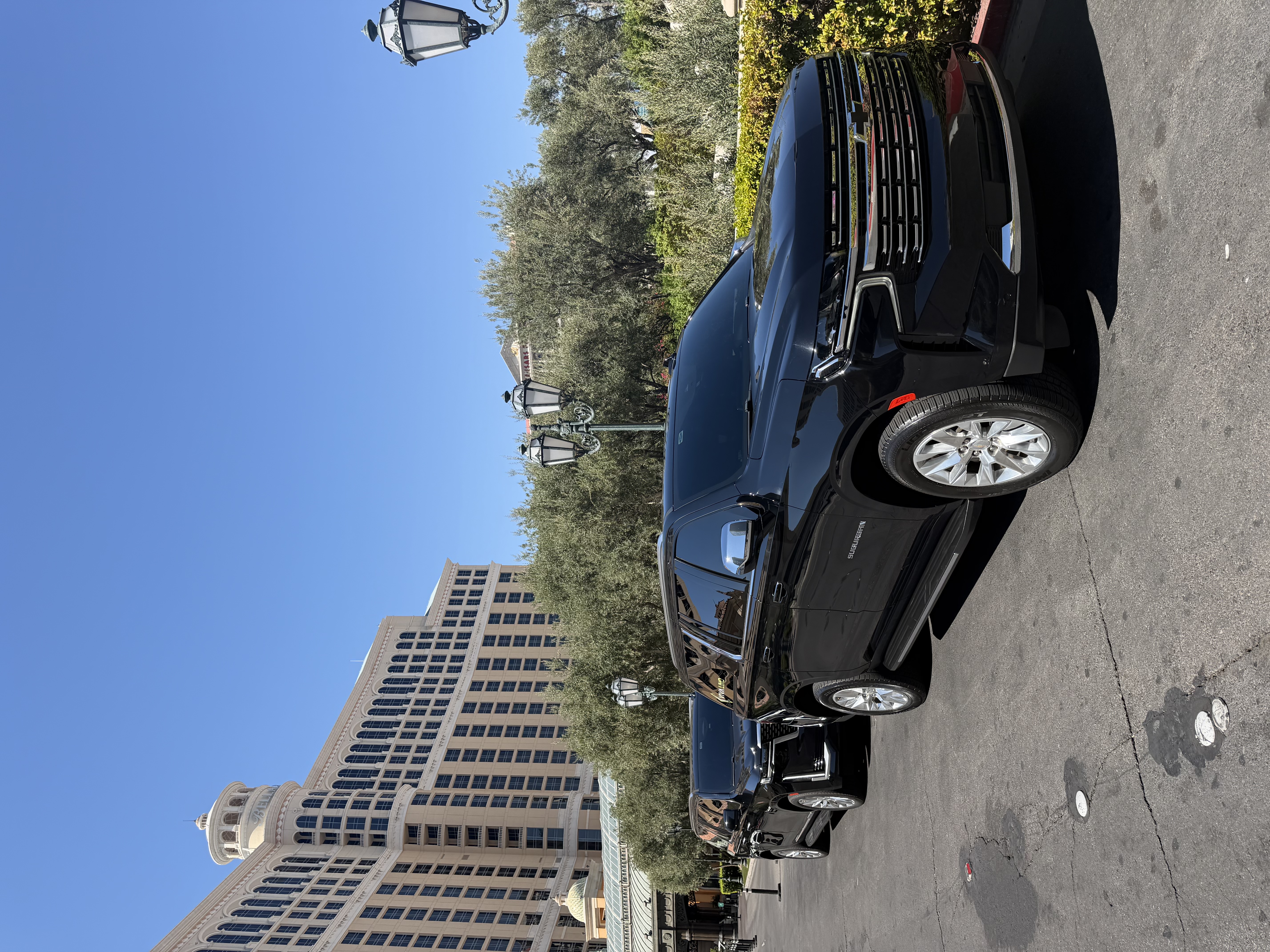 Black Chevrolet Suburban front three-quarter view at the Bellagio in Las Vegas