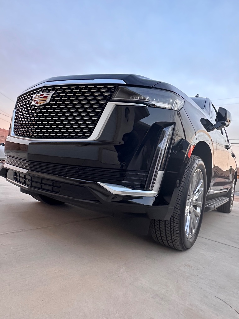 Black Cadillac Escalade front three-quarter view