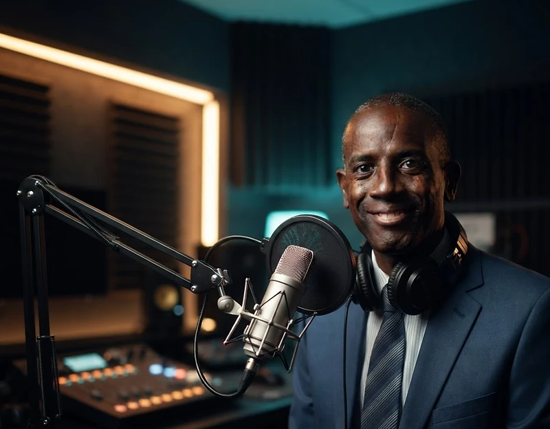 Cllr Danny Carter behind the microphone at Explosive Beatz Studios